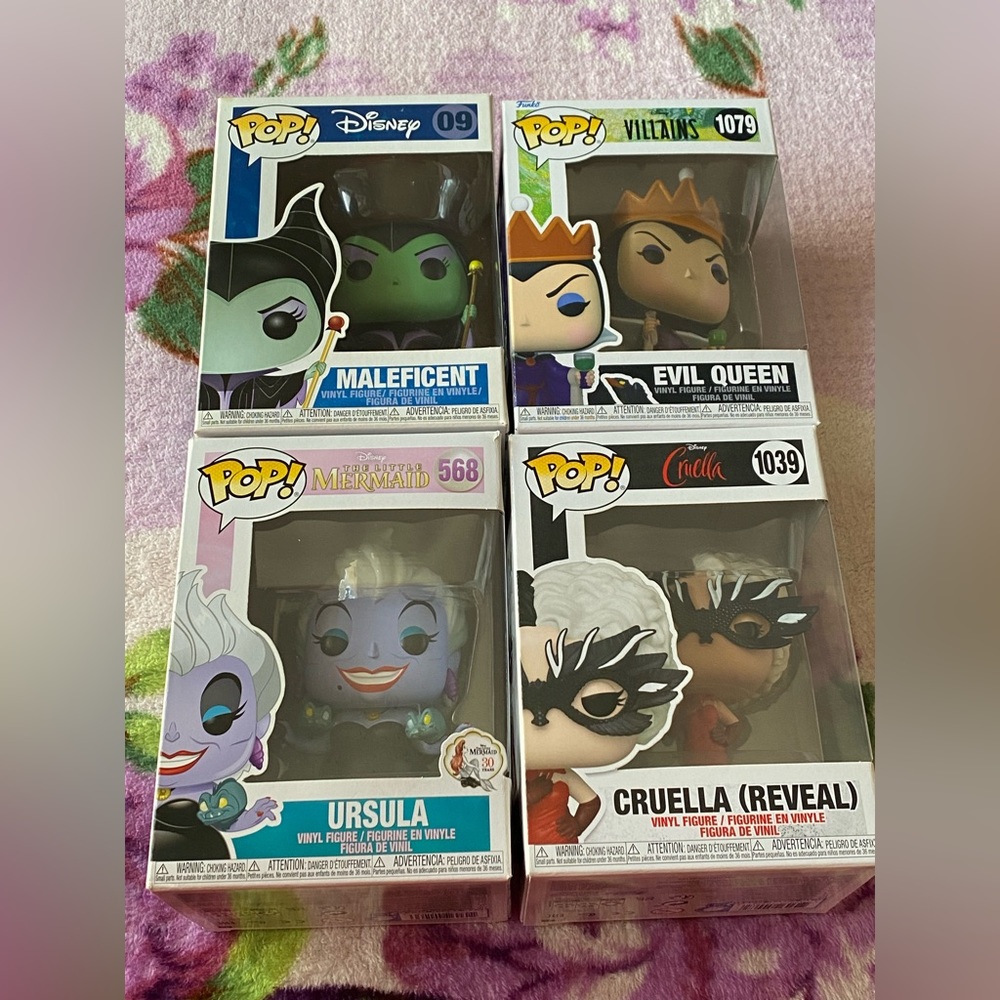 Four Villains Funko Pops: Maleficent, Evil Queen, Ursula, and Cruella